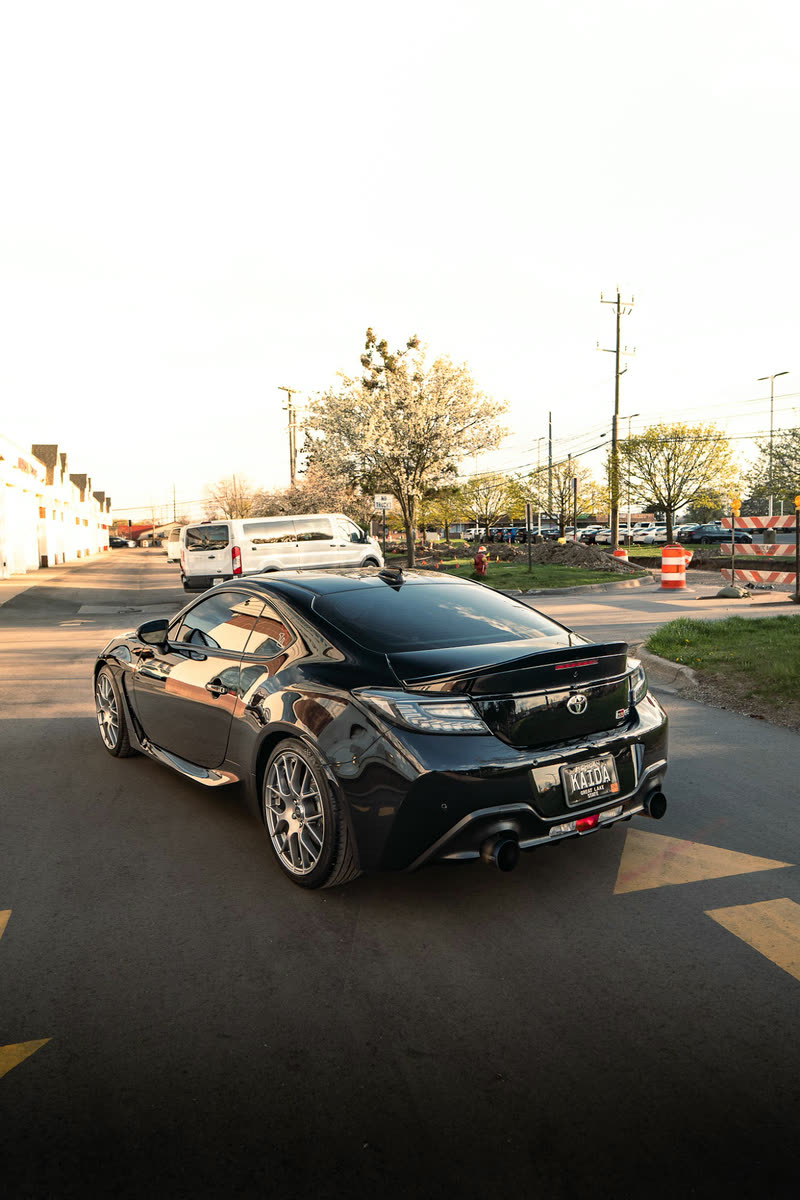 Black Toyota GR86 on an asphalt lot